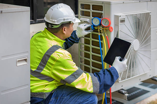 Professional Air Duct Cleaning technician working in Fort Myers Beach, FL